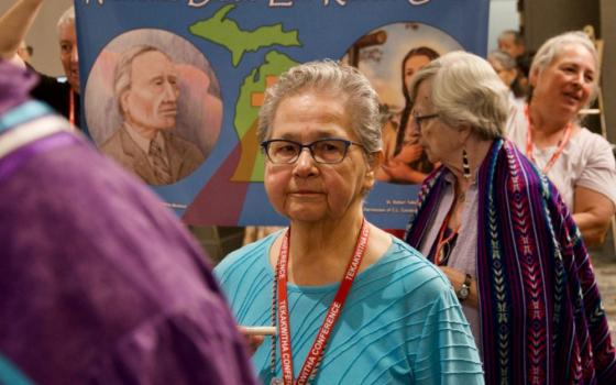 Sr. Kateri Mitchell, a member of the Sisters of St. Anne and the Mohawk Tribe, takes part in the Grand Entry at the Tekakwitha Conference July 20 in Minneapolis, Minnesota. (GSR photo/Dan Stockman)
