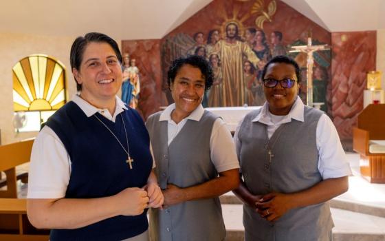 Salesian Sr. Ana Cristina Chavira Sáenz, director of Comunidad Sagrada Familia (Holy Family Community), stands in the convent’s chapel in Monterrey, Mexico. With her are Sr. Inés Berrios Calderon, left, and Sr. Marie Pierrette. Holy Family Community helps migrant children maintain their studies while adapting to life in Mexico. (GSR photo/Nuri Vallbona)