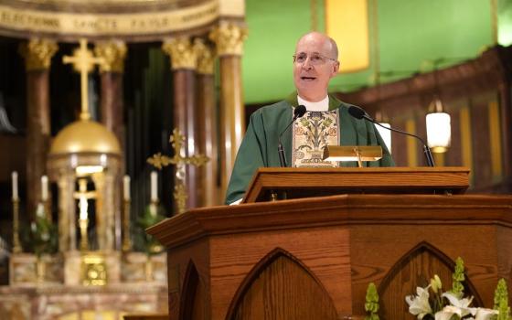 Jesuit Father James Martin delivers the homily during the closing Mass for the Outreach LGBTQ Catholic Ministry Conference at the Church of St. Paul the Apostle in New York City June 18, 2023.