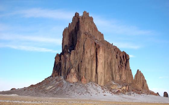 A photograph of Ship Rock, a geological formation, in Navajo Nation, New Mexico; in Navajo, it is called tsé bida'hi, "rock with wings." (Wikimedia Commons/Bowie Snodgrass, CC BY 2.0)