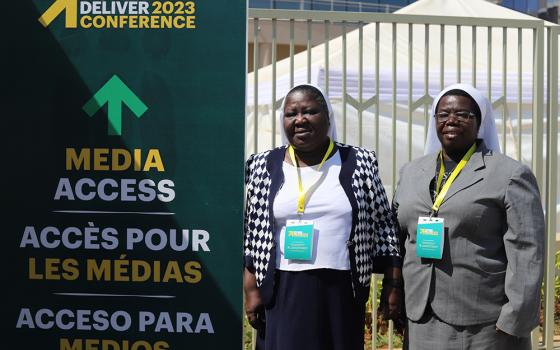 Sr. Rosemary Nyirumbe, a member of Sisters of the Sacred Heart of Jesus, and Sr. Josephine Anto, a member of the Society of the Holy Child Jesus, pose for a photo outside the Women Deliver Conference Arena, July 17 in Kigali, Rwanda. (GSR photo/Doreen Ajiambo)
