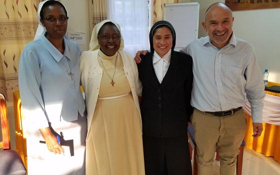The Center for Applied Research in the Apostolate and the International Union of Superiors General facilitate a monthly exchange of data for elder care. Key participants include, from left: Sr. Candida Mukundi of the Assumption Sisters of Nairobi; Sr. Bibiana Ngundo of the Little Sisters of St. Francis; Brenda Hernandez of the Daughters of Immaculate Mary of Guadalupe; and Fr. Luis Falcó of the Missionaries of the Holy Spirit. (Courtesy of CARA)