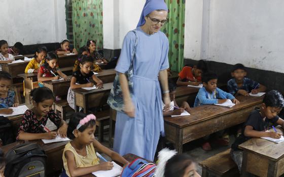 Sr. Ombretta Neri, of the Contemplative Missionary Movement of Charles De Foucauld, visits St. Mary's Infant School ‍in the Rupsha area of Bangladesh and talks to the students. (Stephan Uttom Rozario) 