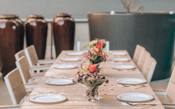 Table set with white plates