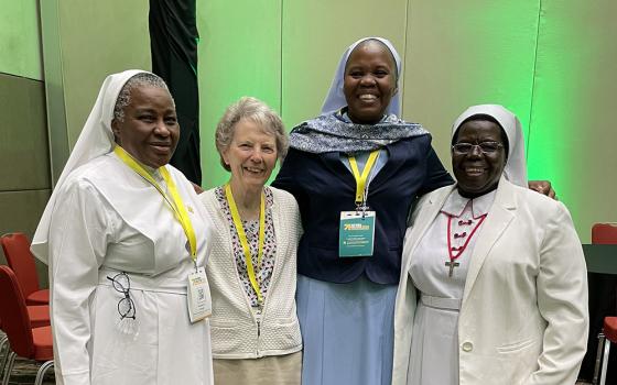 On second from left, Presentation Sr. Joyce Meyer, international liaison for Global Sisters Report, meets with, from left, Sr. Francisca Ngozi Uti, Handmaids of the Holy Child Jesus in Nigeria; Sr. Hedwig Muse, Little Sisters of Mary Immaculate in Kenya; and Sr. Rosemary Nyirumbe, Sisters of the Sacred Heart of Jesus in Uganda, during the Women Deliver conference held July 17-20 in Rwanda. (GSR photo)