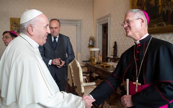 Pope Francis greets Archbishop Paul Etienne of the Archdiocese of Seattle, Washington, during a meeting with bishops from Washington, Oregon, Idaho, Montana and Alaska making their "ad limina" visits to the Vatican Feb. 3, 2020. (CNS/Vatican Media)