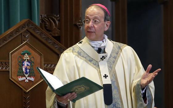 Baltimore Archbishop William Lori leads a funeral Mass March 28, 2017, in Baltimore. The Baltimore Archdiocese filed for Chapter 11 reorganization Sept. 29, days before a new state law goes into effect removing the statute of limitations on child sex abuse claims and allowing victims to sue their abusers decades after the fact. (AP photo/Patrick Semansky, File)