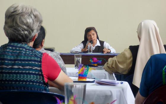 During a seminar on human trafficking Aug. 18, Carmelite Missionary Sr. Verónica Cortez Méndez talks to a group from the Confederation of Latin American Religious about Costa Rica's response to migrants who travel through the country. As migration increases, so do the chances of potential human-trafficking victims, said experts who spoke to the group. (GSR photo/Rhina Guidos)