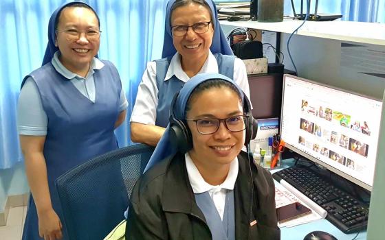 Pauline Sr. Pinky B. Barrientos (standing on right) with Sr. Parichat Jullamonthon (standing on left) and Sr. Josephine Tablante (seated in front), are in charge of the congregation's media production studio at the provincial house and communication center building. The provincial house and communication center building is located across the street opposite the central house. (GSR photo/Oliver Samson)