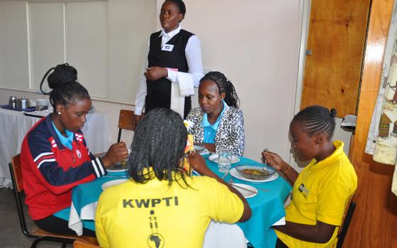 Students of catering are pictured in class at the Kariobangi Women Promotion Training Institute, which is run by the Comboni Missionary Sisters. The institute helps young women in Nairobi's low-income areas. After the training, the students find employment or start their own businesses. (​​Lourine Oluoch)