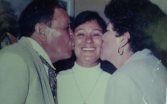 The author, shown with her parents, made her perpetual profession in San Fernando, California, on Aug. 3, 1996. (Courtesy of Maria Elena Mendez Ochoa)
