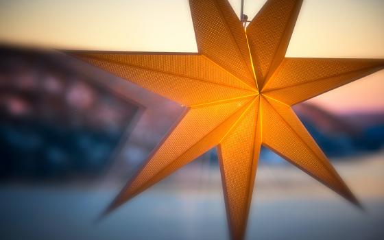 An orange seven-pointed star (Unsplash/Vidar Nordli Mathisen)