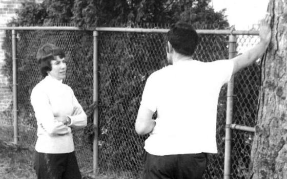 Adrian Dominican Sr. Beth Butler conferrs with an inmate at Southern Michigan State Penitentiary, Jackson, Michigan, in 1971. She educated inmates there for a decade/ (Courtesy of Beth Butler)