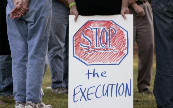Protesters opposed to the death penalty demonstrate outside a Georgia state prison for men in Jackson in this 2008 file photo. 