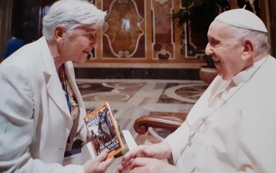 Sr. Anne Lyons presents her book, "The Story of Nano Nagle, A Life Lived on the Razor's Edge," to Pope Francis in October 2022.