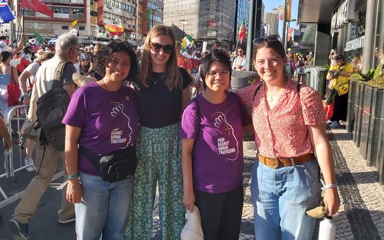 Sr. Abby Avelino, pictured here second from the right, participates in World Youth Day 2023 in Lisbon, Portugal, with Talitha Kum’s international team and youth supporters. (Courtesy of Abby Avelino)