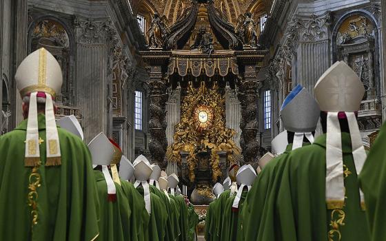 Bishops process into St. Peter's Basilica at the Vatican Oct. 29, 2023, for a Mass marking the conclusion of the first session of the Synod of Bishops on synodality. (CNS/Vatican Media)