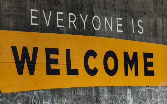 Everyone is welcome sign (Unsplash/Katie Moum)