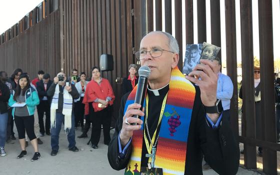 ishop Mark Seitz of El Paso, Texas, is seen Feb. 26, 2019, at the U.S.-Mexico border wall. Seitz spoke of a "broader, brutal, historical project in Texas to criminalize and police people who migrate" during a lecture March 18 at Fairfield University. (OSV News/David Agren)