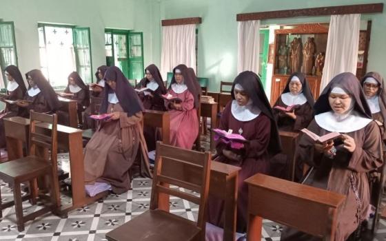 Poor Clares of Perpetual Adoration pray at their monastery in Mymensingh, Bangladesh.