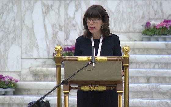 Anna Rowlands, a professor of Catholic social thought and practice at Durham University in England, gives a theological reflection as the assembly of the Synod of Bishops begins work on its section section, communion, in this screengrab from Oct. 9, 2023, in the Vatican's Paul VI Audience Hall. (CNS/YouTube/Vatican Media)