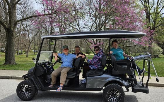  Sr. Emily TeKolste transports sisters to an eclipse-watching party at the campus of the Sisters of Providence of St.-Mary-of-the-Woods, Indiana, on April 8. 