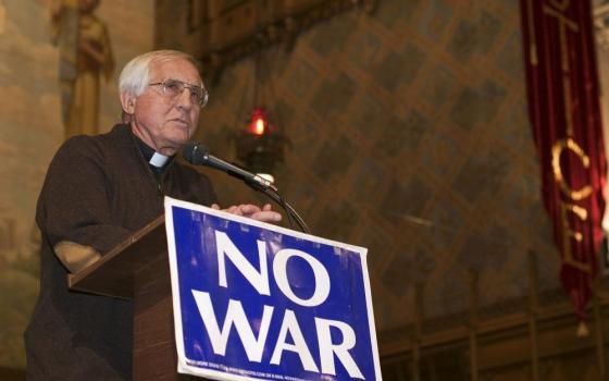 Detroit Auxiliary Bishop Thomas Gumbleton addresses several hundred antiwar activists at Central United Methodist Church in Detroit March 18, at an event marking the second anniversary of the U.S. invasion of Iraq. 