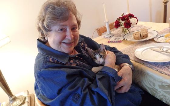 Elizabeth Johnson’s view of creation as a circle of kinship, rather than a hierarchy of being, means that yes, your dog or cat will go to heaven. She is pictured here with her cat Orion, named because "she is a constellation of beauty," Johnson says. (Courtesy of Elizabeth Johnson)