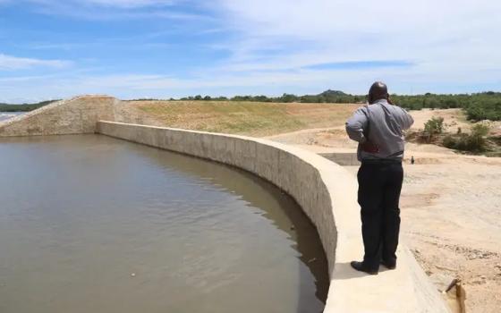 Bishop Rudolf Nyandoro of the Catholic Diocese of Gweru in Zimbabwe inspects the Holy Cross Dam in a February 2024 photo. (Courtesy of the Diocese of Gweru)