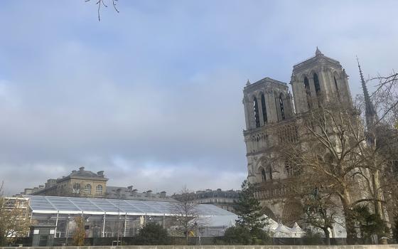 Notre Dame Cathedral as seen on Dec. 1, still under construction ahead of its Dec. 8 inauguration Mass. The cathedral has been closed since the April 15, 2019, fire that nearly destroyed the 860-year-old landmark. (NCR photo/Christopher White) 