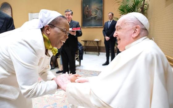 Sr. Jane Wakahiu, a member of the Institute of the Little Sisters of Saint Francis, Kenya, and associate vice president for program operations and head of Catholic Sisters for the Conrad N. Hilton Foundation, meets with Pope Francis at the Vatican in January. (Courtesy of Hilton Foundation)