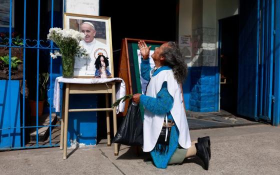Woman prays.