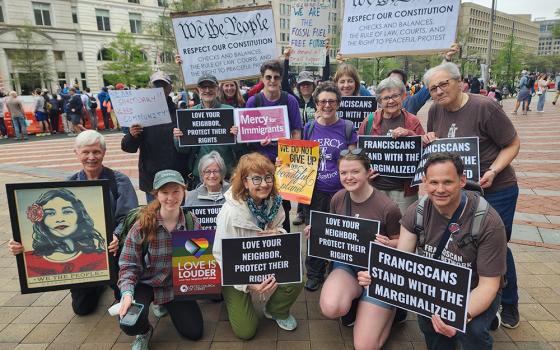 A group of more than a dozen faith-based activists — sisters of different congregations, lay associates, supporters — who participated in the April 5 "Hands Off!" demonstration in Washington D.C. were among those attending the nationwide rally. (GSR photo/Chris Herlinger)