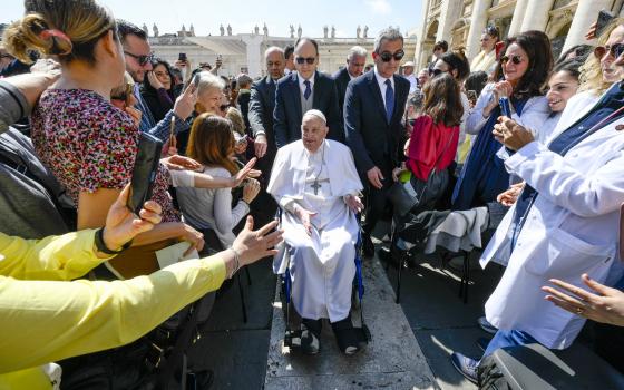 In this image released by Vatican Media, Pope Francis arrives in a wheelchair at the end of a mass in St. Peter's Square at The Vatican, Sunday, April 6, 2025, part of the Jubilee of the sick and the health workers. (Vatican Media via AP, HO)
