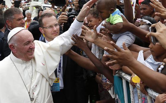 Pope Francis greets people near the Talitha Qum homeless shelter in Cartagena, Colombia, on Sept. 10, 2017. Pope Francis, formerly Argentine Cardinal Jorge Mario Bergoglio, died April 21, 2025, at age 88. (CNS/Paul Haring)