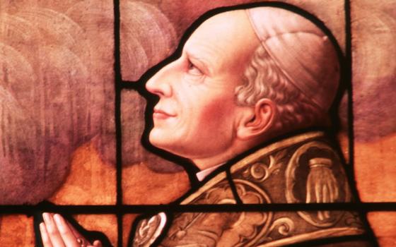 Leo XIII, who served as pope 1878-1903, is depicted in a window at Holy Family Church in Mitchell, South Dakota, in a 1999 file photo. His 1891 encyclical on labor, Rerum Novarum, marks the start of modern Catholic social teaching. (CNS/Crosiers)