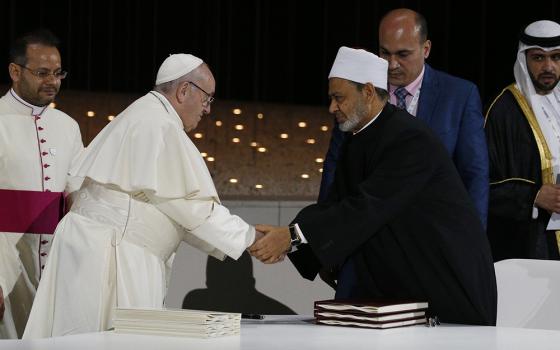Pope Francis shakes hands with Sheik Ahmed al-Tayeb, grand imam of Egypt's Al-Azhar Mosque and University, during a document signing at an interreligious meeting at the Founder's Memorial in Abu Dhabi, United Arab Emirates, in this Feb. 4, 2019, file photo. Pope Francis, died April 21, 2025, at age 88. (CNS/Paul Haring)