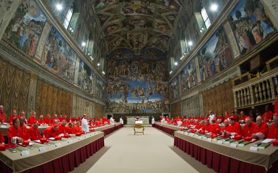 Cardinals from around the world pray in the Sistine Chapel at the Vatican March 12, 2013, before beginning the conclave to elect a successor to Pope Benedict XVI. The following day, on the fifth ballot, they elected Cardinal Jorge Mario Bergoglio of Buenos Aires, Argentina, who chose the name Francis. (CNS/Vatican Media)