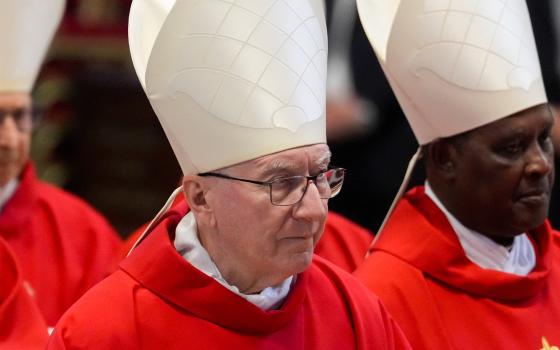 Cardinal Pietro Parolin, Vatican secretary of state, processes into St. Peter's Basilica at the beginning of Mass on the seventh day of the "novendiali," nine days of mourning for Pope Francis, at the Vatican May 2, 2025. (CNS photo/Lola Gomez)