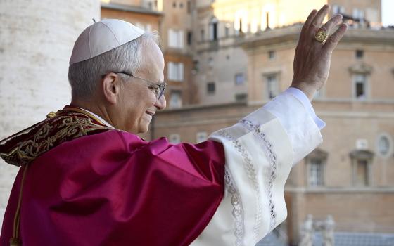 Pope Leo XIV, the former Cardinal Robert F. Prevost, waves to the crowds in St. Peter's Square at the Vatican after his election as pope May 8, 2025. The new pope was born in Chicago. (CNS/Vatican Media)