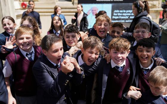 Students from Everest Academy in Lemont, Ill., cheer May 8, 2025, react after it was announced that Chicago-born Cardinal Robert Francis Prevost was elected as the next pope. He chose the papal name Leo XIV. (OSV News/Reuters/Vincent Alban)