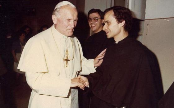 An undated file photo shows Pope John Paul II greeting then-Augustinian Fr. Robert Francis Prevost, now Pope Leo XIV. He became the first U.S. pope in history to be elected pope May 8, 2025, at the Vatican. (OSV News/Augustinian Province of Our Mother of Good Counsel handout via Reuters)