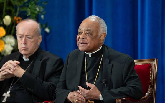 Cardinal Wilton Gregory, retired archbishop of Washington, speaks at a news conference May 9, 2025, at the Pontifical North American College in Rome while his successor, Cardinal Robert McElroy, listens. (CNS/Kendall McLaren)