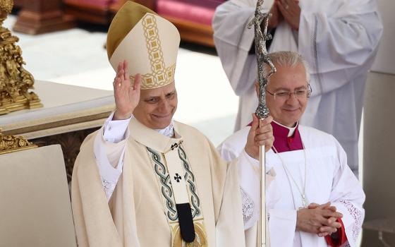 Pope Leo XIV, formerly Cardinal Robert Francis Prevost, waves at the conclusion of his inauguration Mass at the Vatican May 18, 2025. He is the first U.S. pope in history. (OSV News/Reuters/Guglielmo Mangiapane)