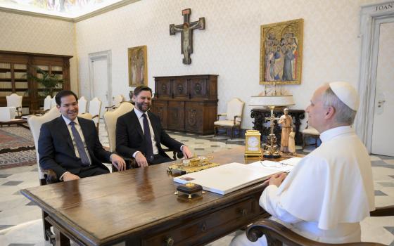 Pope Leo XIV meets with U.S. Vice President JD Vance and Secretary of State Marco Rubio in the library of the Apostolic Palace at the Vatican May 19, 2025. (CNS photo/Vatican Media)
