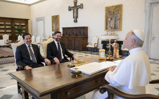 Pope Leo XIV meets with U.S. Vice President JD Vance and Secretary of State Marco Rubio in the library of the Apostolic Palace at the Vatican May 19, 2025. (CNS photo/Vatican Media)