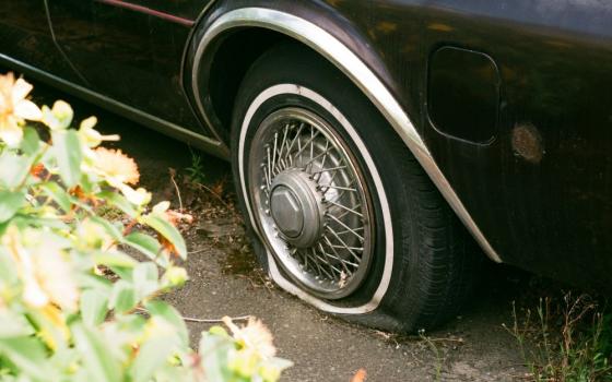 car with flat tire