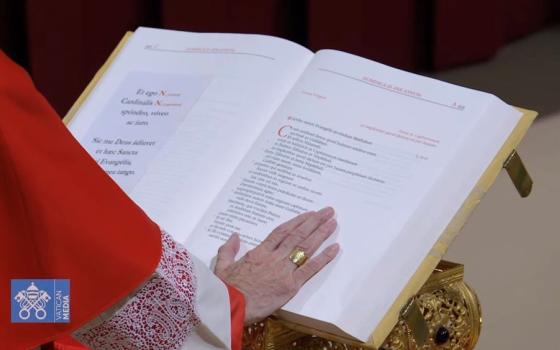 Hand on book