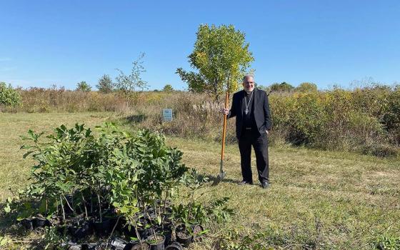 Bishop John Stowe of Lexington, Kentucky, stands beside a newly planted tree in Hisle Park. In September 2023, the diocese partnered with Green Forest Work on a tree planting day to celebrate the Season of Creation, with 300 new saplings placed in the ground. (Kevin Steele)
