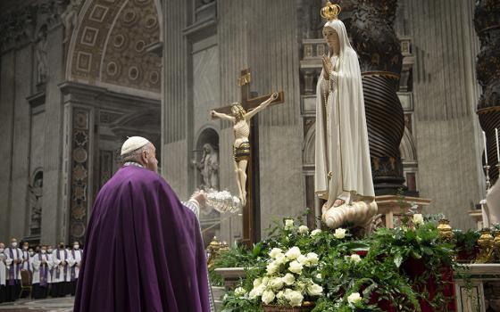 Pope Francis burns incense in front of a Marian statue after consecrating the world, and in particular Ukraine and Russia, to the Immaculate Heart of Mary during a Lenten penance service in St. Peter's Basilica at the Vatican March 25, 2022. A year later, he asked Catholics worldwide to renew the consecration and pray for peace. Pope Francis, formerly Argentine Cardinal Jorge Mario Bergoglio, died April 21, 2025, at age 88. (CNS/Vatican Media)